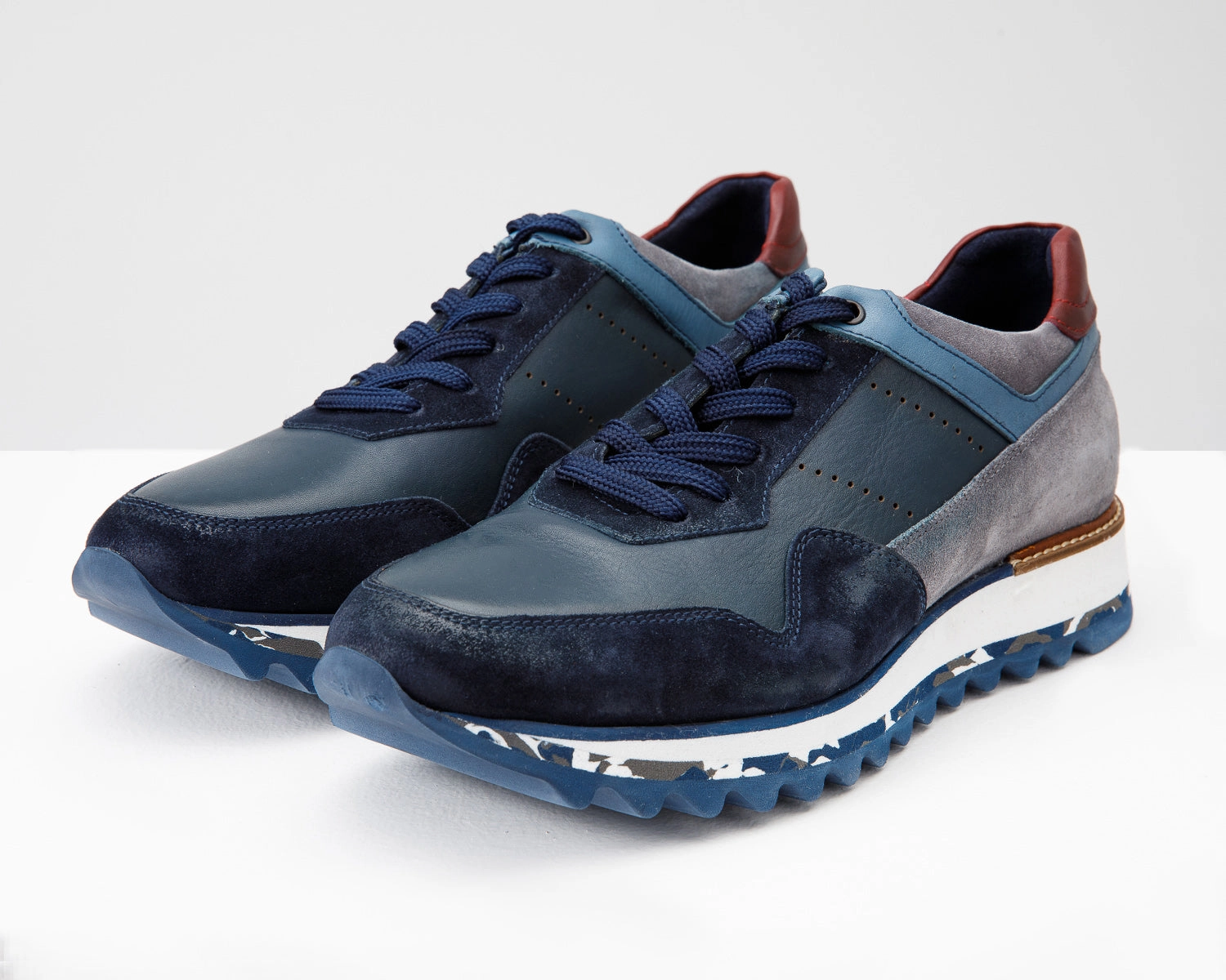 The Hoskova Navy Blue Leather Men Sneaker Ultra Responsive Foam