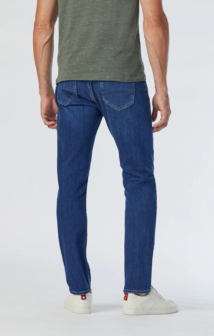 JAKE SLIM LEG JEANS IN INDIGO BRUSHED WILLIAMSBURG fade resistant color