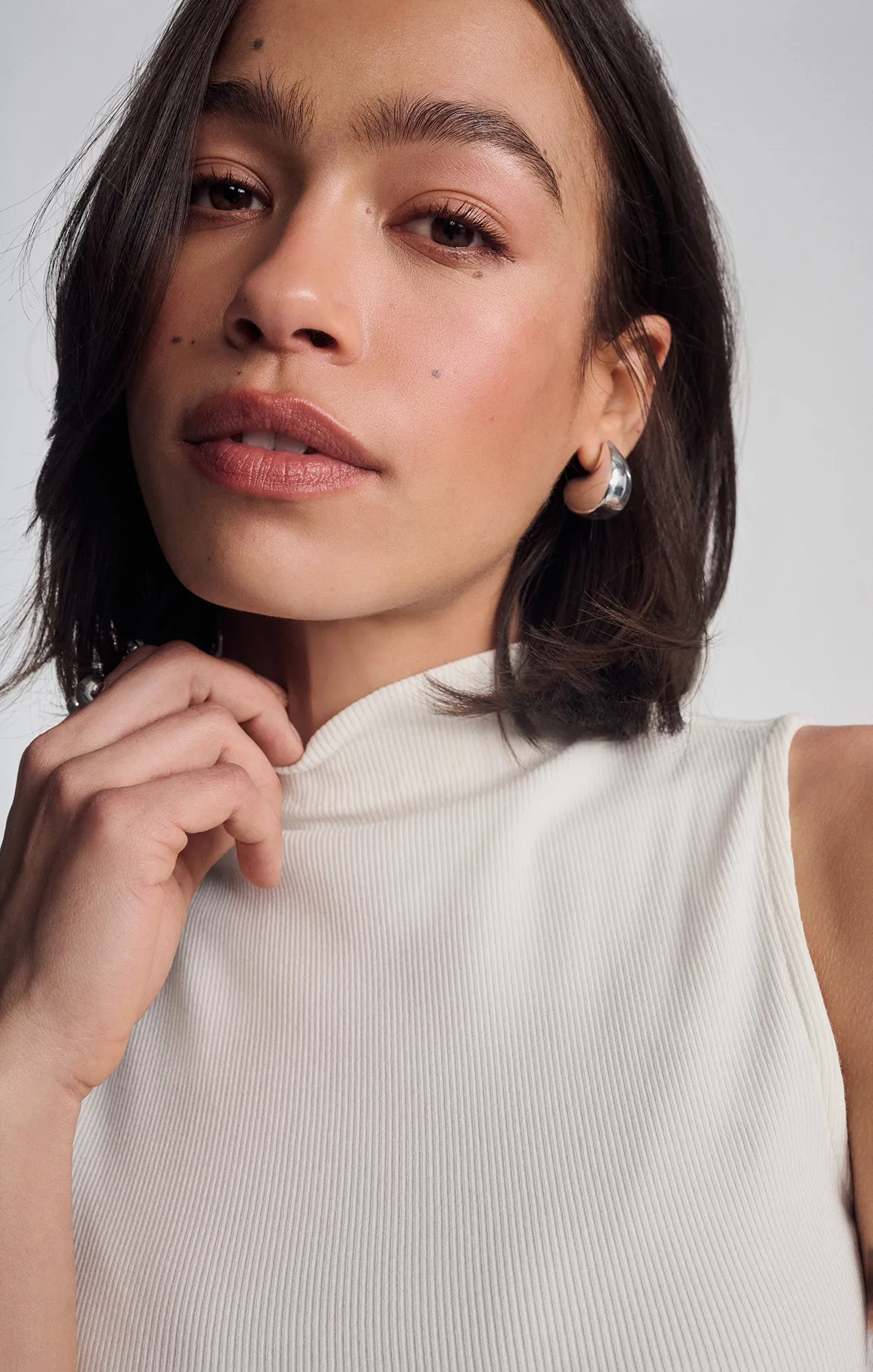 Tailored Cut Edgy style MOCK NECK TANK TOP IN ANTIQUE WHITE