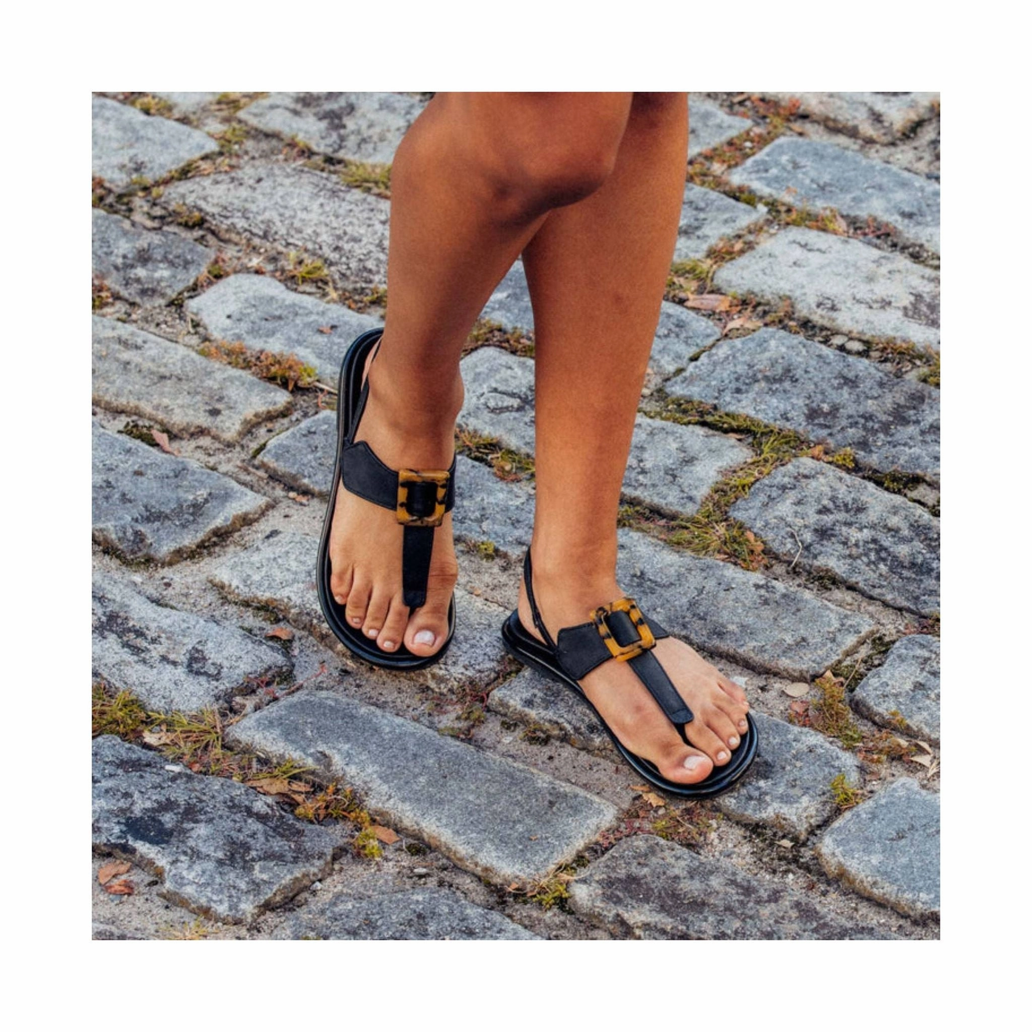 Low Profile Silhouette Sturdy Sole Construction Olukai Women's Lait Bar Sandal - Black