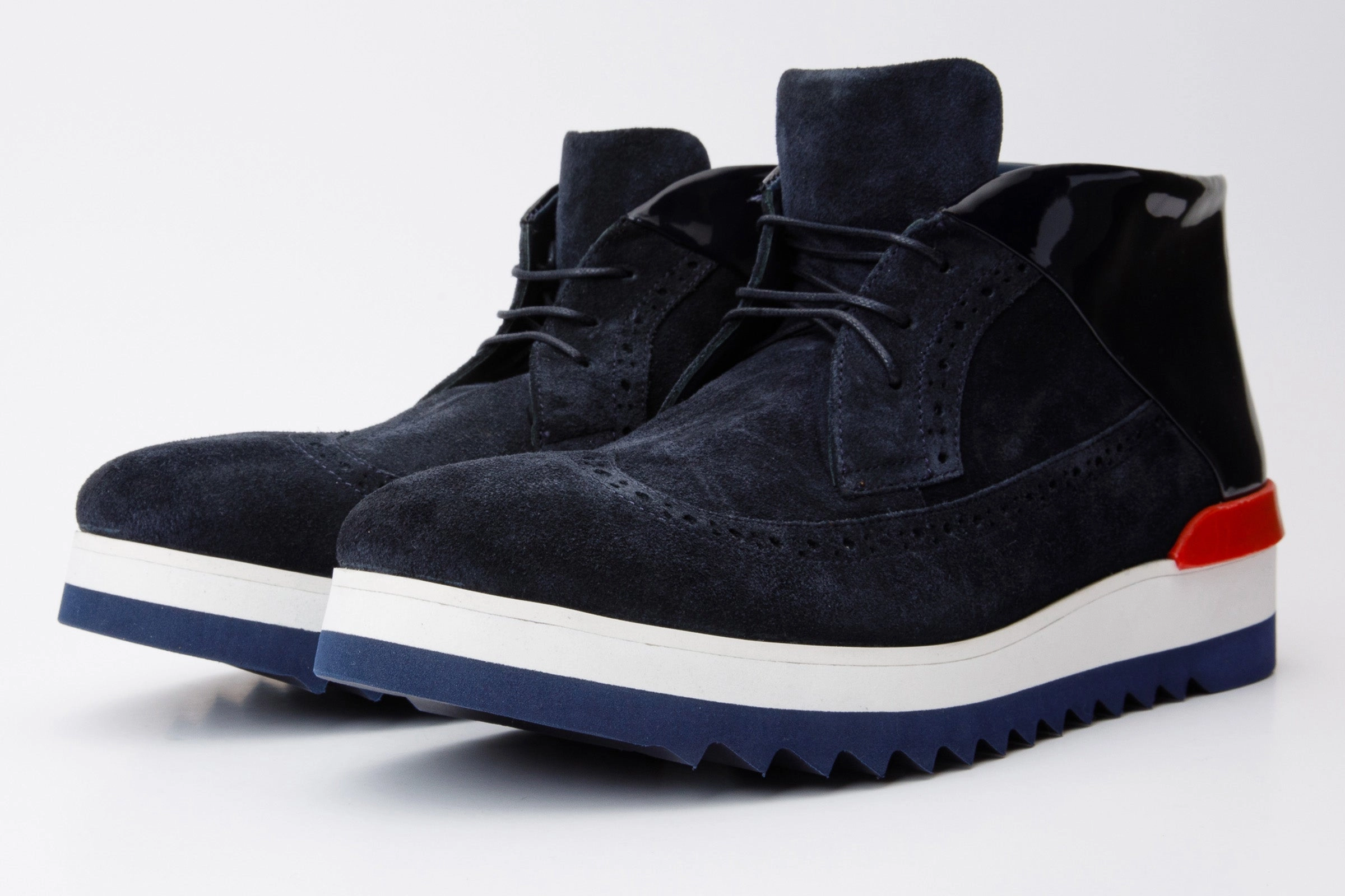 Rockered Outsole Design Unibody Construction The Kagan Navy Blue Wingtip Chukka Men Sneaker Boot